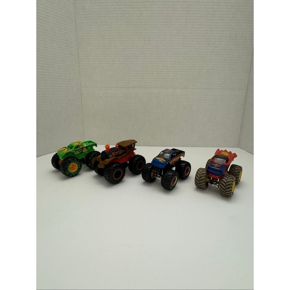 Hot Wheels Monster Trucks Set of 4 Loco Punk Superman Gunkster Beat That